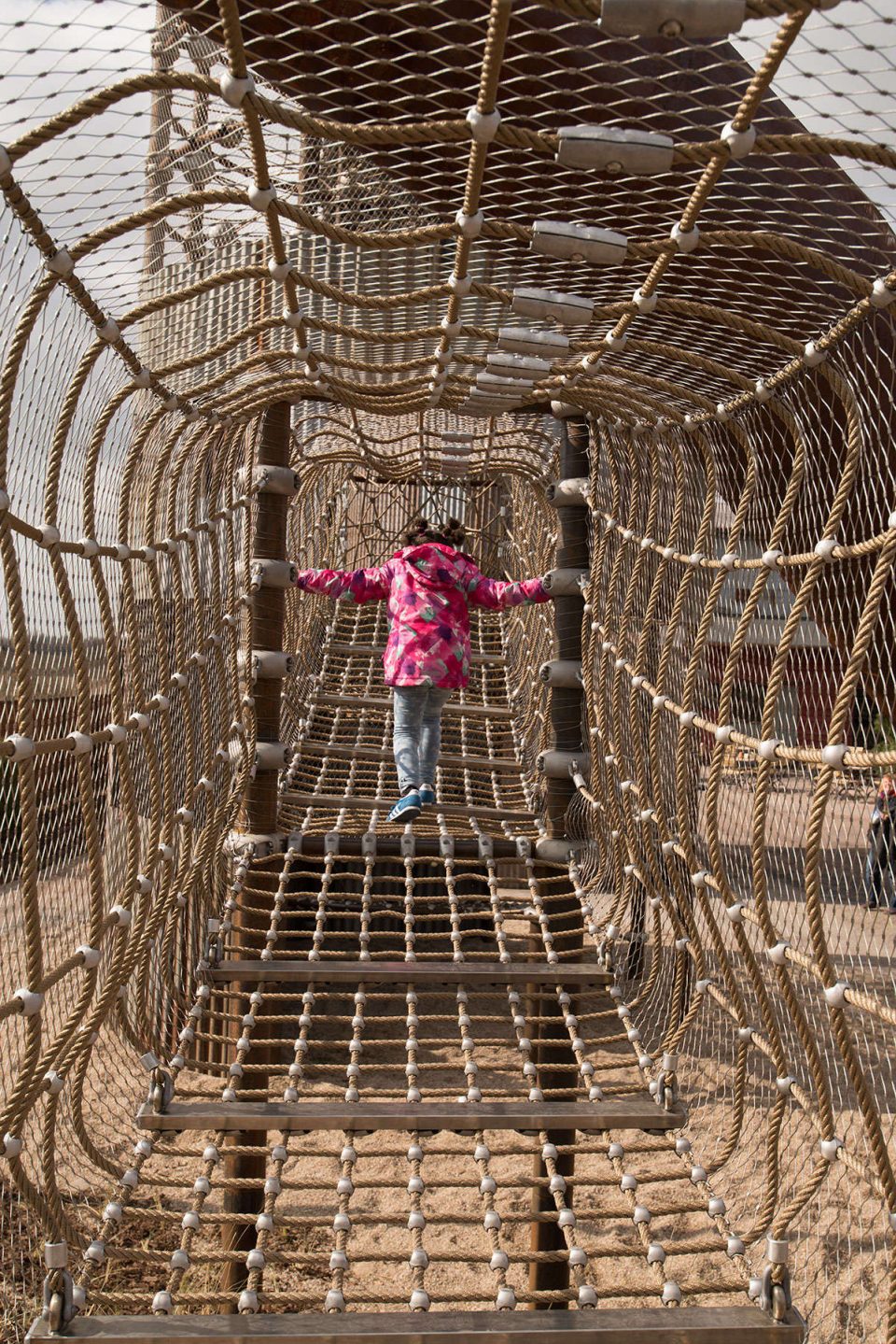 Net tunnel connects the climbing tower with a terrace